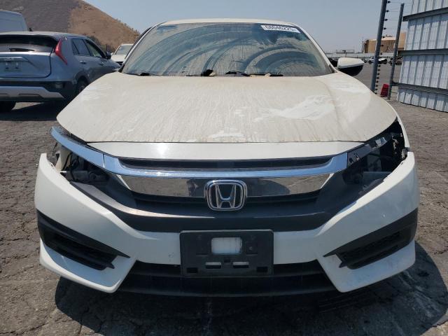 Photo 5 from auction – 2017 HONDA CIVIC LX with VIN 2HGFC2F50HH548377