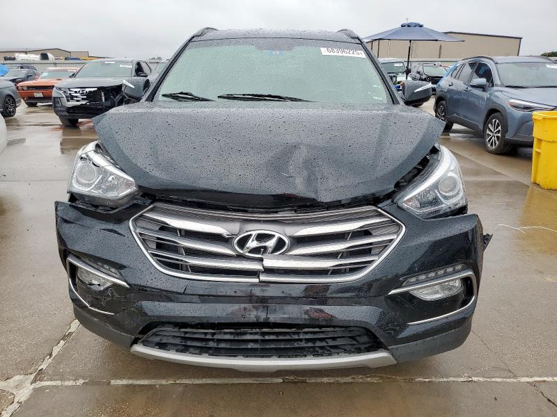 Photo 5 from auction – 2018 HYUNDAI SANTA FE S with VIN 5NMZU3LB8JH058238