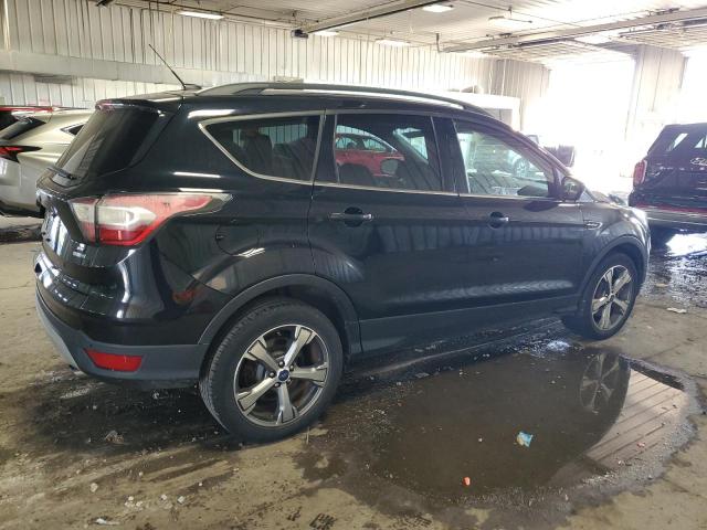 Photo 3 from auction – 2017 FORD ESCAPE SE with VIN 1FMCU9GD0HUA58575