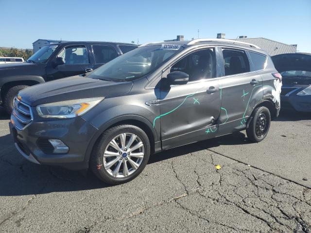 FORD ESCAPE TIT 2017 with VIN 1FMCU0JD4HUC80783 - Photo from auction
