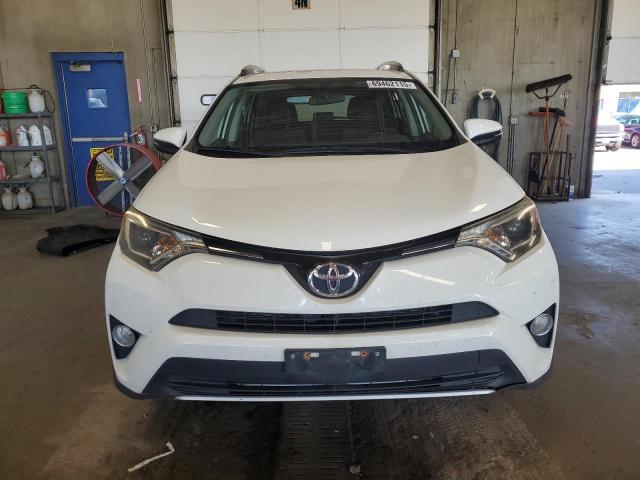 Photo 5 from auction – 2016 TOYOTA RAV4 XLE with VIN JTMRFREV0GJ091614