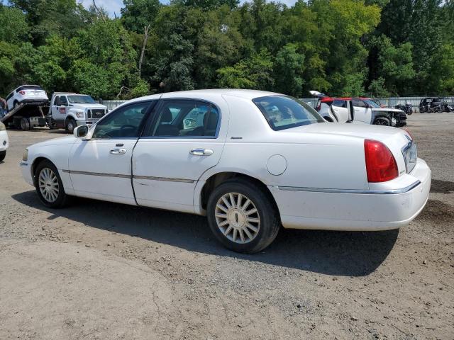 Photo 2 from auction – 2004 LINCOLN TOWN CAR E with VIN 1LNHM81W74Y632781