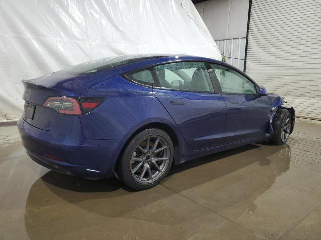 Photo 3 from auction – 2022 TESLA MODEL 3 with VIN 5YJ3E1EA6NF372537