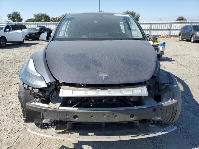 Photo 5 from auction – 2023 TESLA MODEL Y with VIN 7SAYGAEE4PF744787