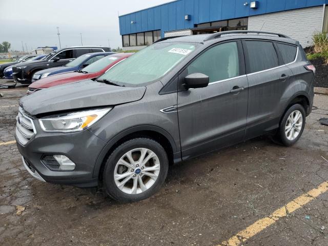 FORD ESCAPE SE 2018 with VIN 1FMCU0GD6JUC68907 - Photo from auction