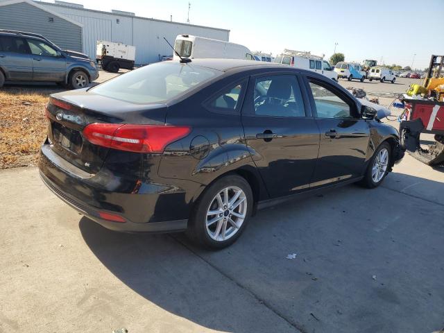 Photo 3 from auction – 2016 FORD FOCUS SE with VIN 1FADP3F28GL255940