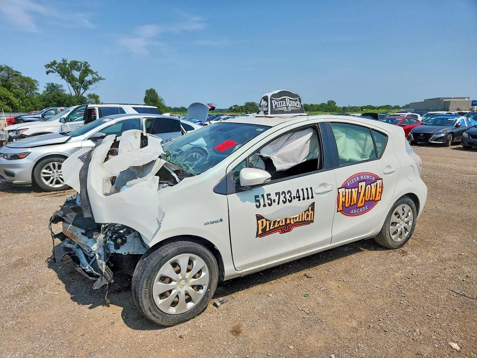 TOYOTA PRIUS C 2014 with VIN JTDKDTB35E1069578 - Photo from auction