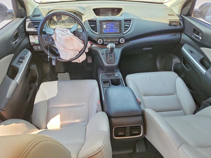 Photo 8 from auction – 2016 HONDA CR-V with VIN 5J6RM3H93GL011691