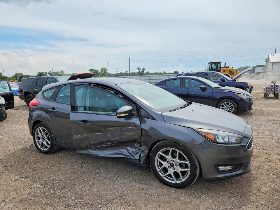 Photo 4 from auction – 2015 FORD FOCUS with VIN 1FADP3K26FL386885