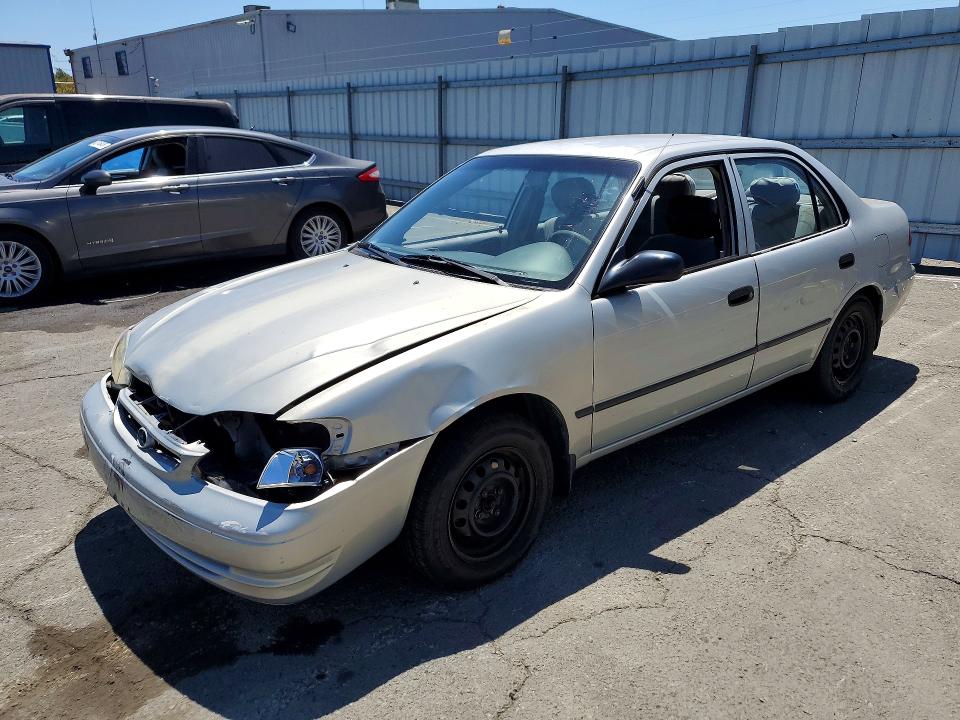 TOYOTA COROLLA 2000 with VIN 1NXBR12E9YZ330944 - Photo from auction
