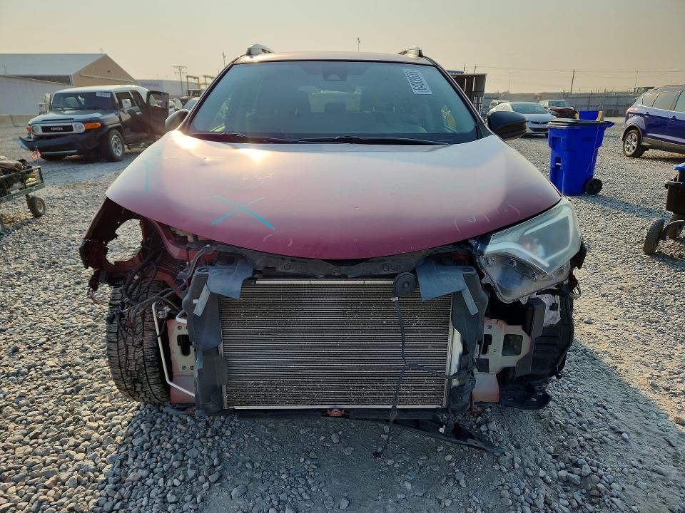 Photo 5 from auction – 2018 TOYOTA RAV4 with VIN 2T3BFREV7JW725950