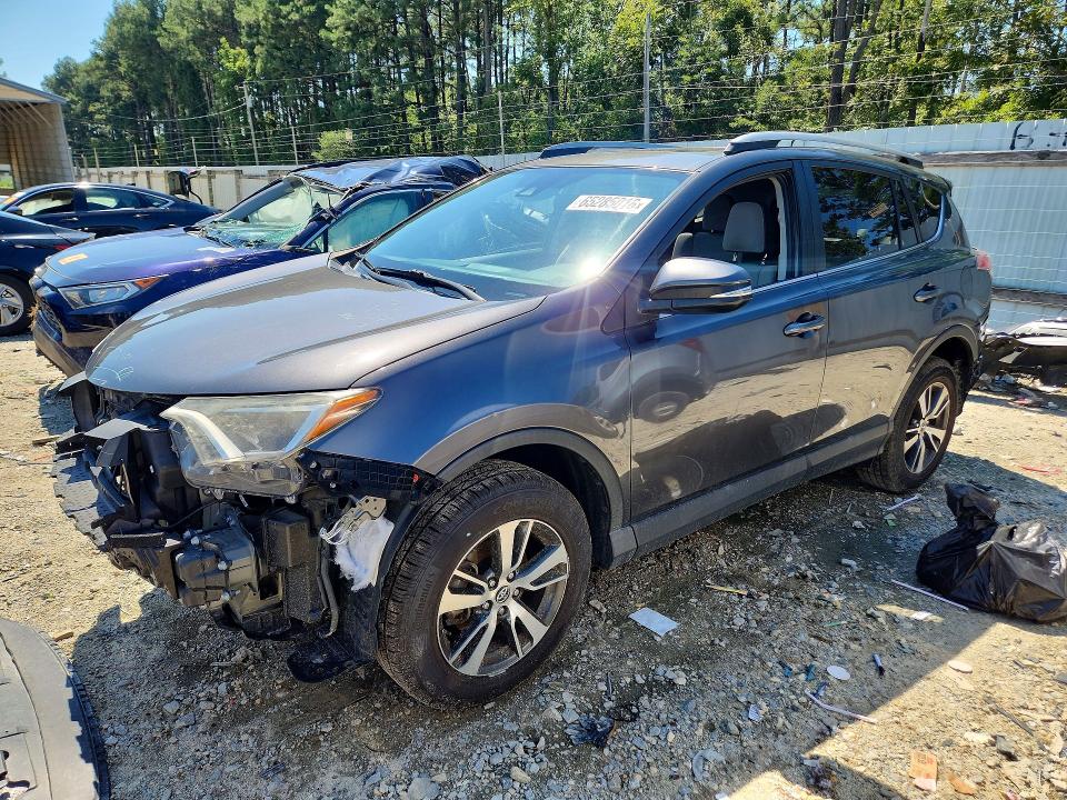 TOYOTA RAV4 2018 with VIN 2T3WFREV0JW491149 - Photo from auction