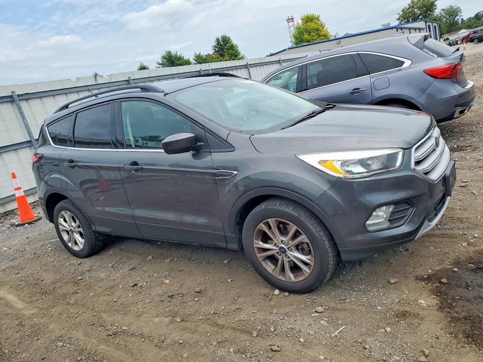 Photo 4 from auction – 2018 FORD ESCAPE with VIN 1FMCU9GD5JUB05394