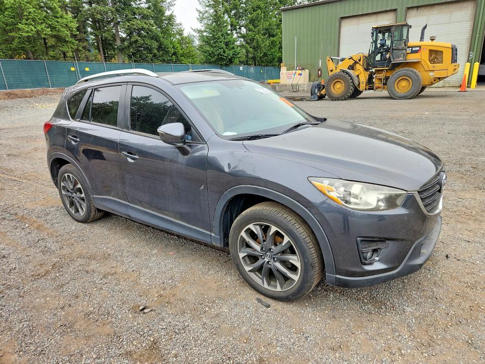 Photo 4 from auction – 2016 MAZDA CX-5 with VIN JM3KE4DY6G0621245
