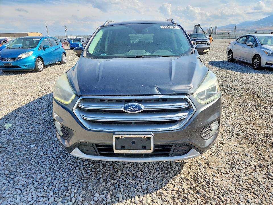 Photo 5 from auction – 2017 FORD ESCAPE with VIN 1FMCU9J95HUC28868