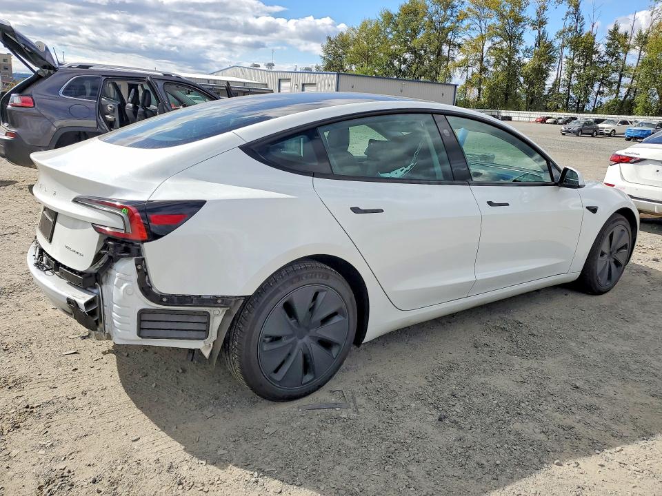Снимка 3 от търг – 2024 TESLA MODEL 3 с VIN 5YJ3E1EB5RF770224