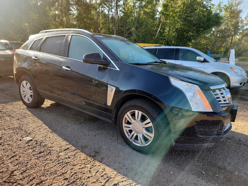 Photo 4 from auction – 2014 CADILLAC SRX with VIN 3GYFNEE34ES634269