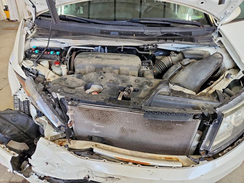Photo 12 from auction – 2016 HONDA ODYSSEY with VIN 5FNRL5H66GB014002