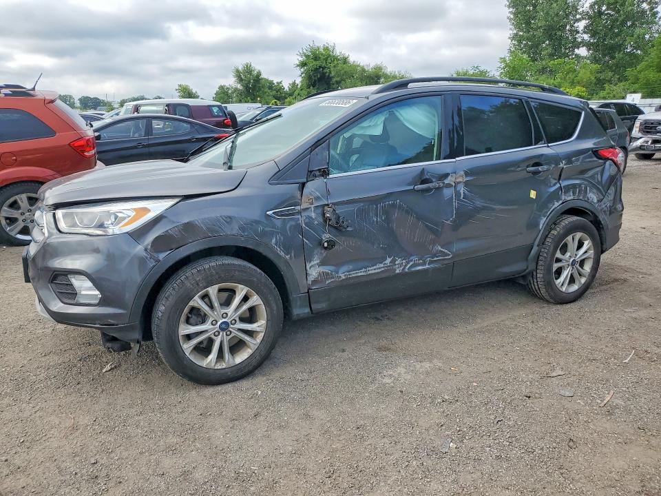 FORD ESCAPE 2018 with VIN 1FMCU9HD5JUB62936 - Photo from auction