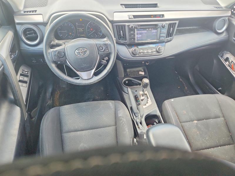 Photo 8 from auction – 2018 TOYOTA RAV4 with VIN 2T3RFREV5JW797910