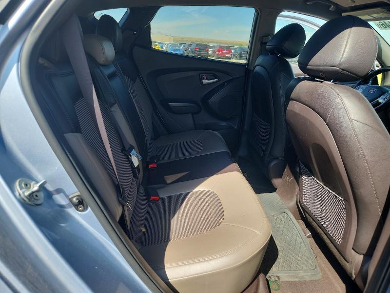 Photo 11 from auction – 2012 HYUNDAI TUCSON with VIN KM8JUCAC6CU379940