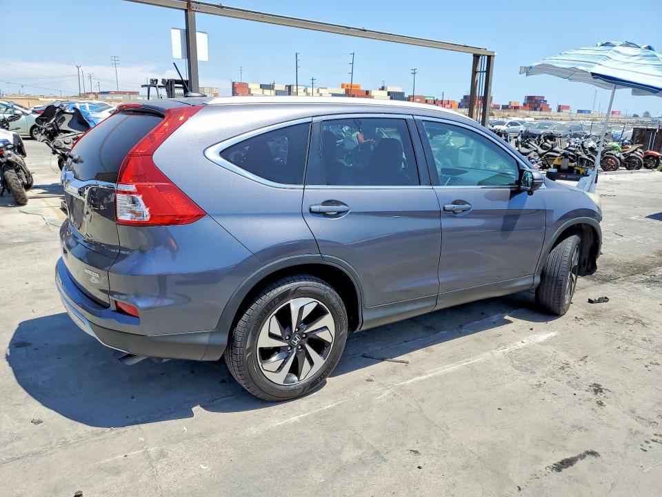 Photo 3 from auction – 2015 HONDA CR-V with VIN 5J6RM3H93FL018736