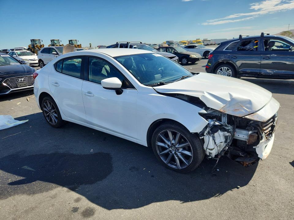 Photo 4 from auction – 2017 MAZDA 3 with VIN 3MZBN1V74HM127488