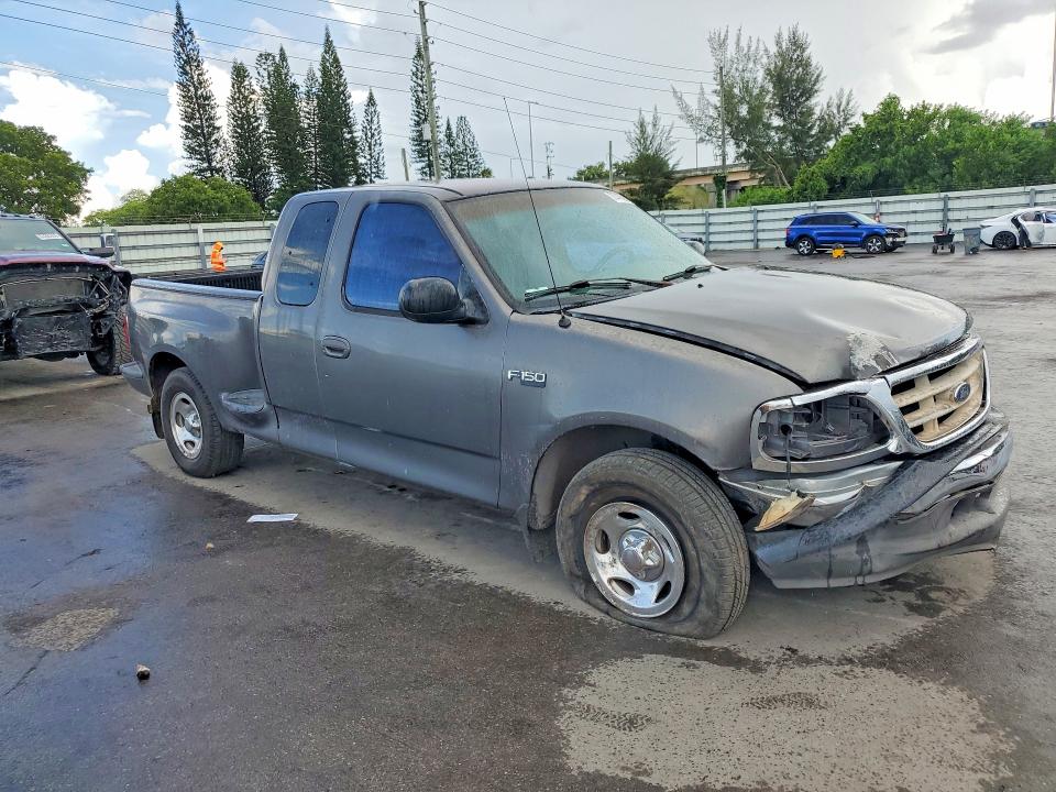 Photo 4 from auction – 2003 FORD F150 with VIN 1FTRX07283KC89874