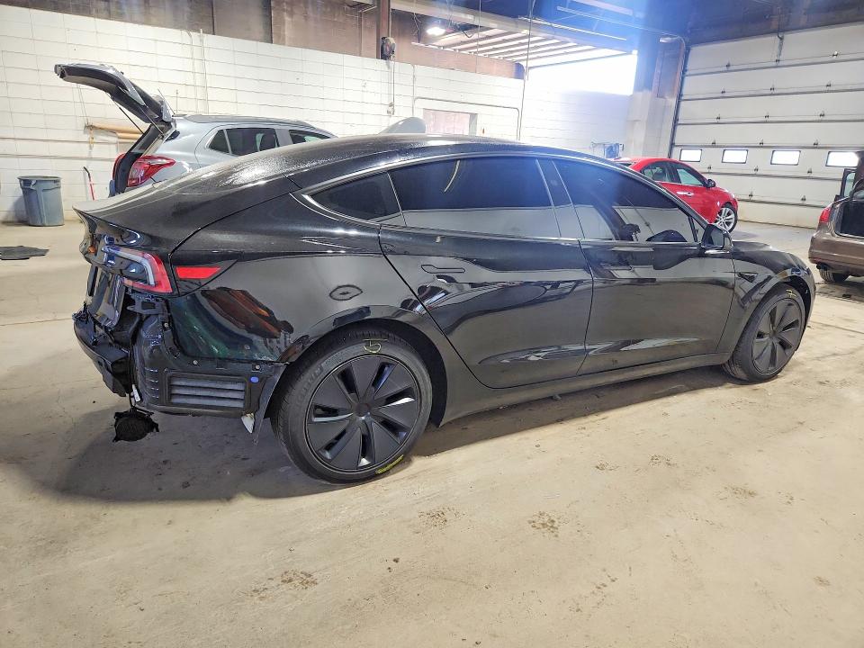 Снимка 3 от търг – 2025 TESLA MODEL 3 с VIN 5YJ3E1EA9SF077556