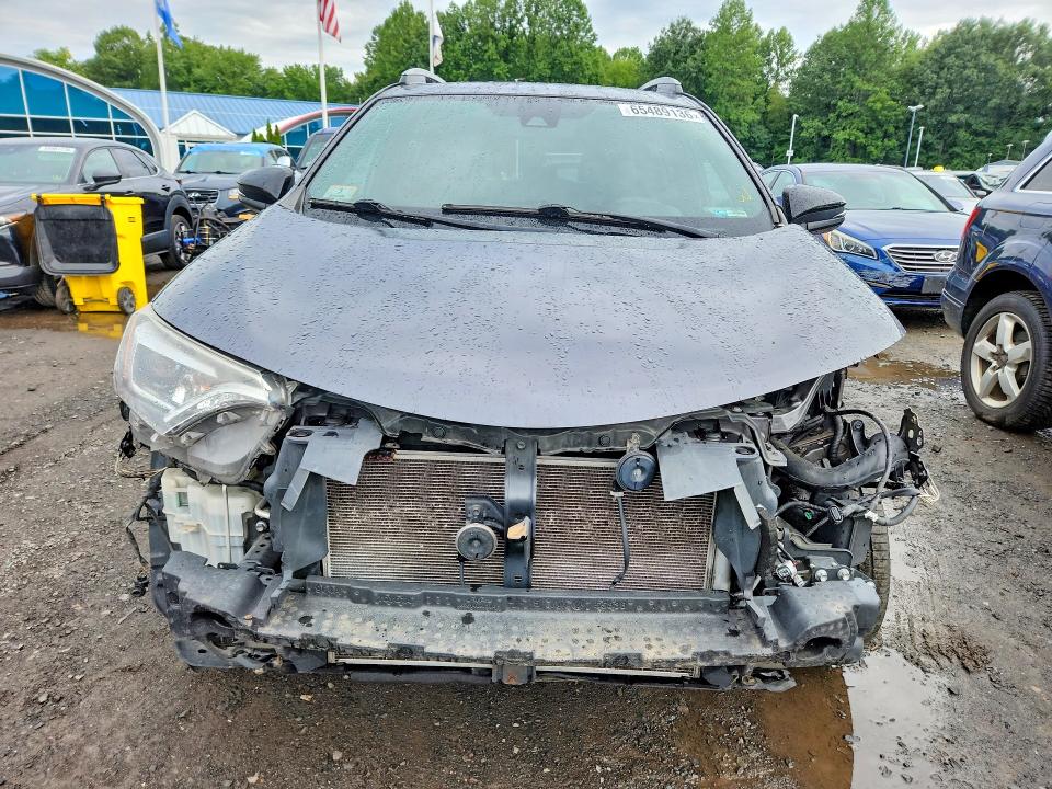 Photo 5 from auction – 2018 TOYOTA RAV4 with VIN 2T3JFREVXJW746447