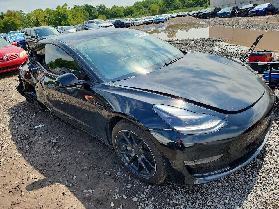 Photo 4 from auction – 2021 TESLA MODEL 3 with VIN 5YJ3E1EA8MF029050