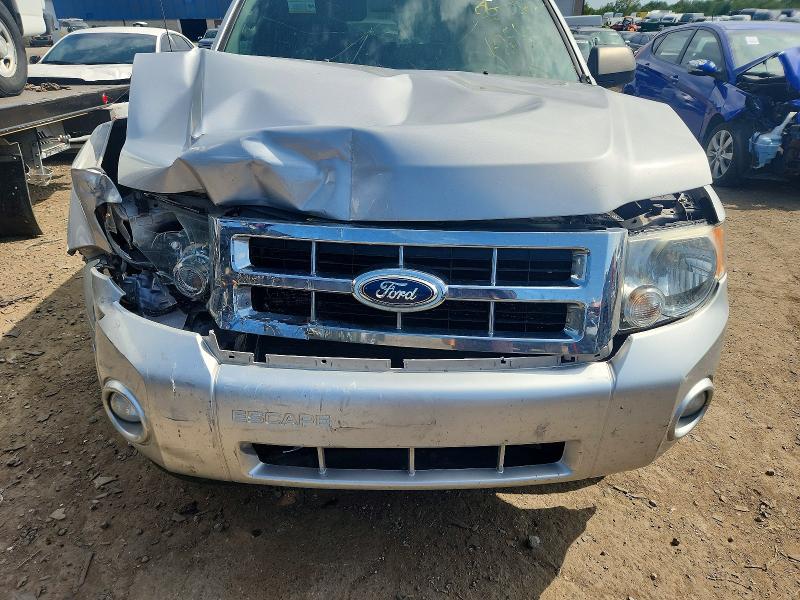 Photo 11 from auction – 2011 FORD ESCAPE with VIN 1FMCU0DGXBKB02546