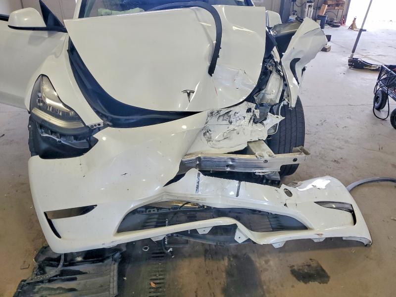 Снимка 11 от търг – 2023 TESLA MODEL Y с VIN 7SAYGDEE3PA108389
