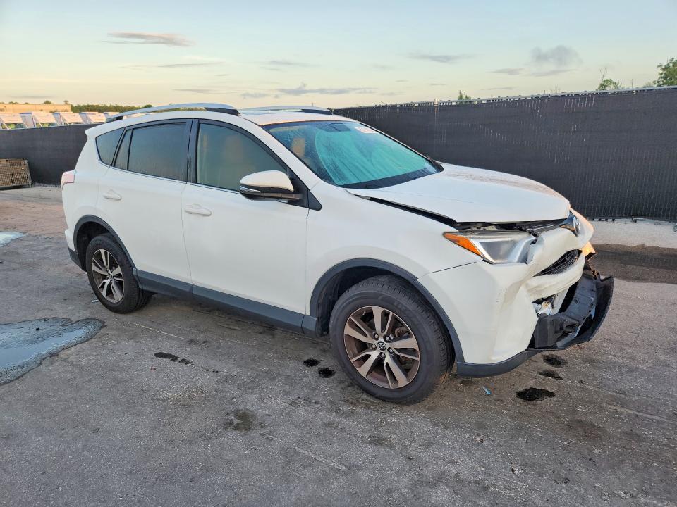 Photo 4 from auction – 2016 TOYOTA RAV4 with VIN JTMWFREV4GJ094907
