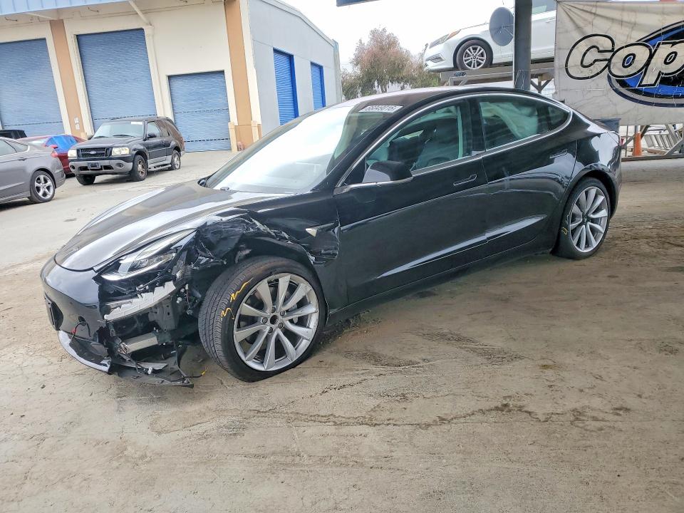 TESLA MODEL 3 2018 with VIN 5YJ3E1EA4JF075857 - Photo from auction