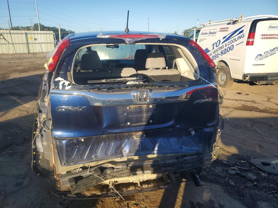 Photo 6 from auction – 2016 HONDA CR-V with VIN 5J6RM4H48GL028187