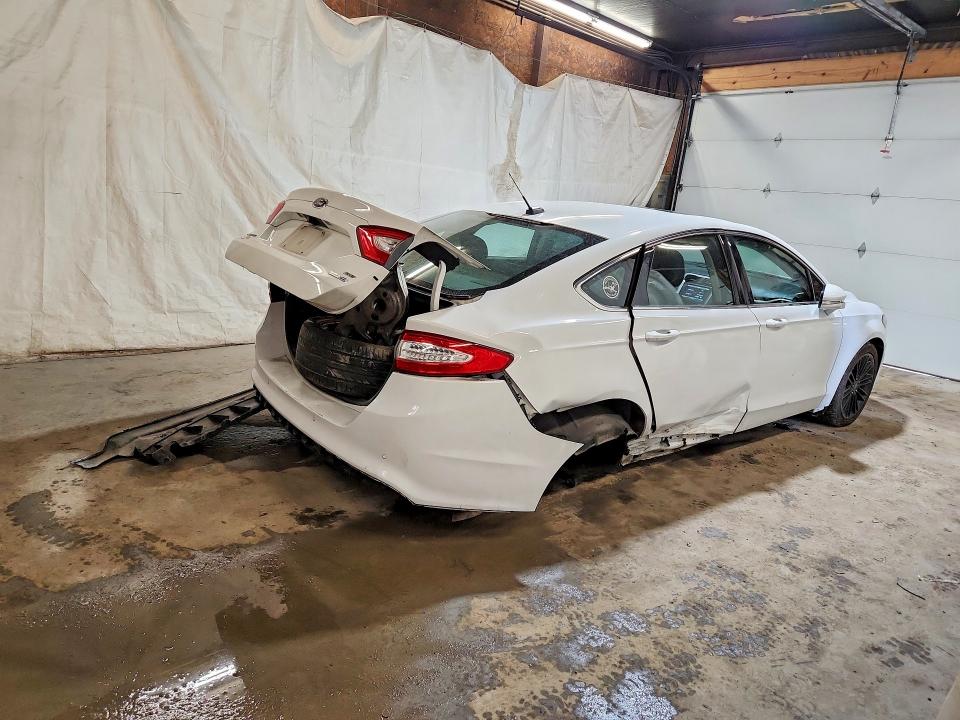 Photo 3 from auction – 2016 FORD FUSION with VIN 3FA6P0T99GR162337