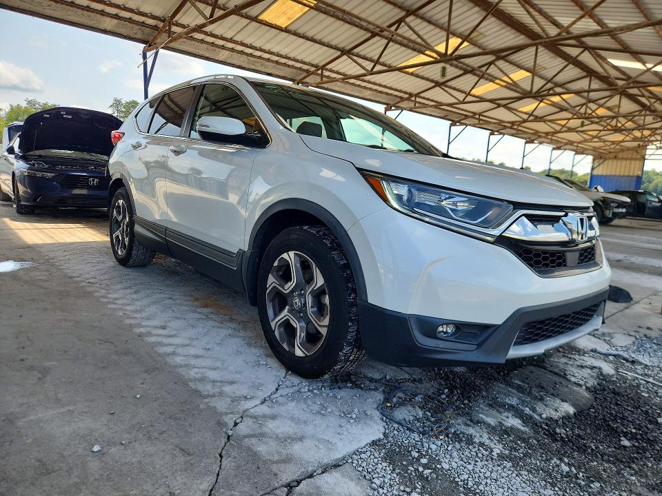 Photo 4 from auction – 2019 HONDA CR-V with VIN 7FARW1H84KE006642