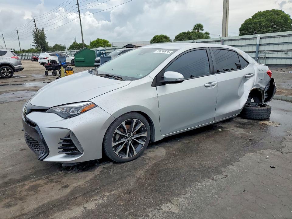 TOYOTA COROLLA 2017 with VIN 5YFBURHE3HP655577 - Photo from auction