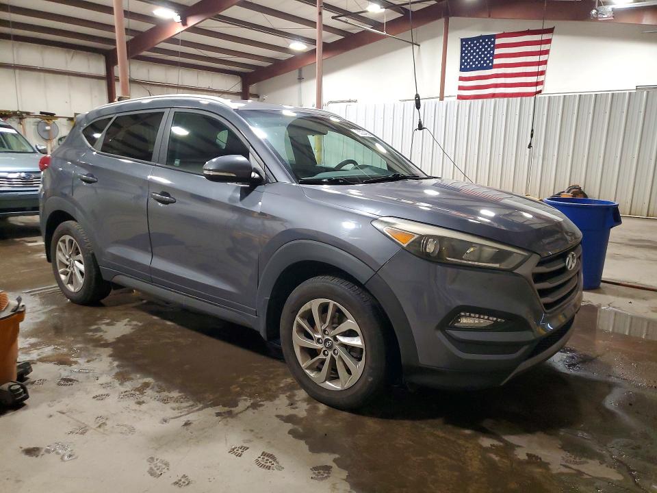 Photo 4 from auction – 2016 HYUNDAI TUCSON with VIN KM8J33A2XGU039271