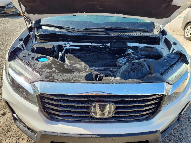 Photo 11 from auction – 2021 HONDA RIDGELINE with VIN 5FPYK3F73MB019658