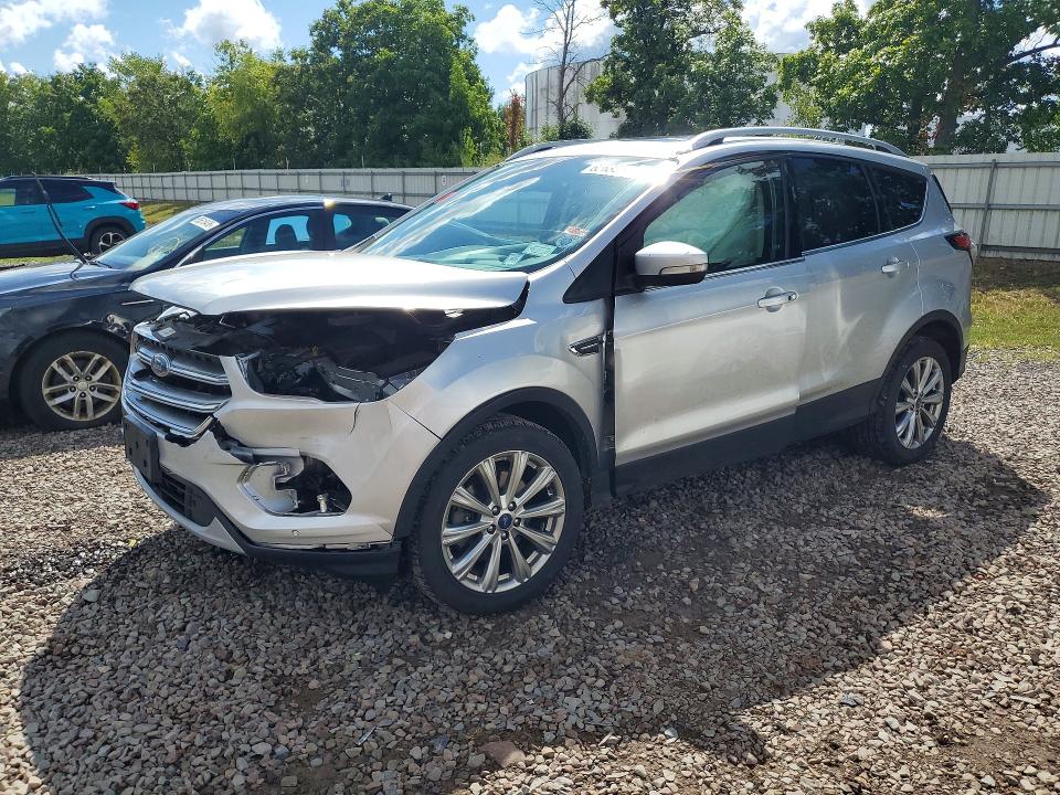 FORD ESCAPE 2017 with VIN 1FMCU9J97HUE83148 - Photo from auction