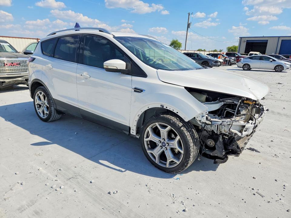 Photo 4 from auction – 2017 FORD ESCAPE with VIN 1FMCU0J95HUE15670
