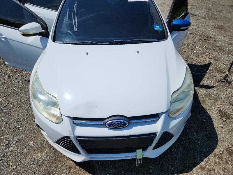 Photo 11 from auction – 2014 FORD FOCUS with VIN 1FADP3K20EL141434