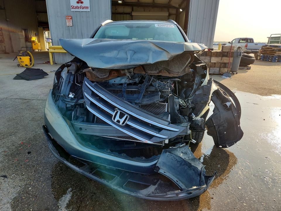 Photo 5 from auction – 2012 HONDA CR-V with VIN JHLRM3H77CC001473