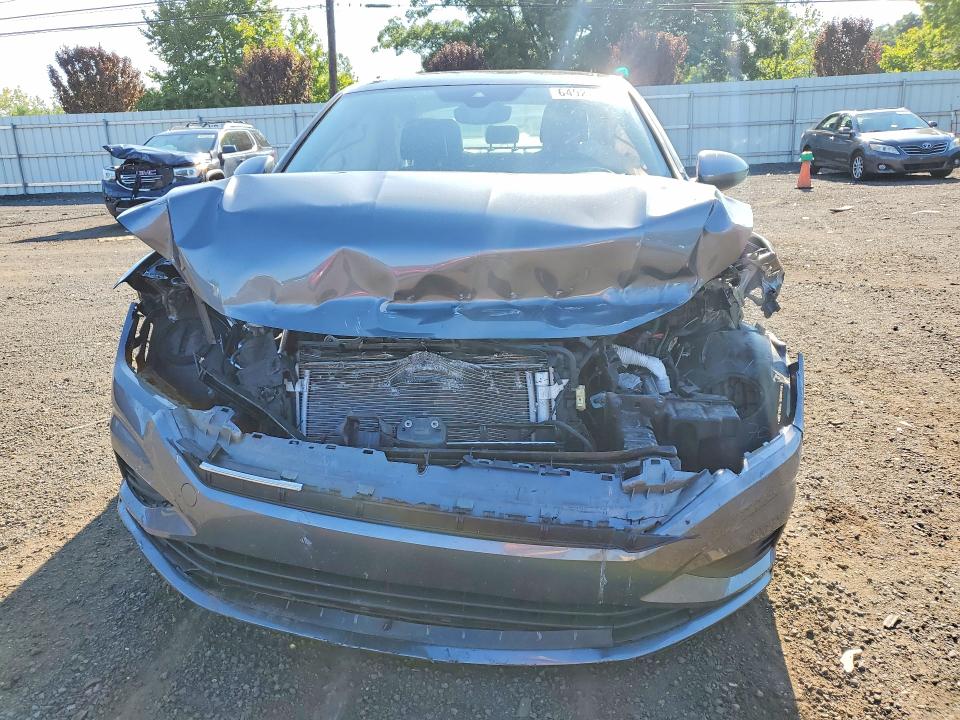 Photo 5 from auction – 2021 VOLKSWAGEN JETTA with VIN 3VWE57BU8MM095942