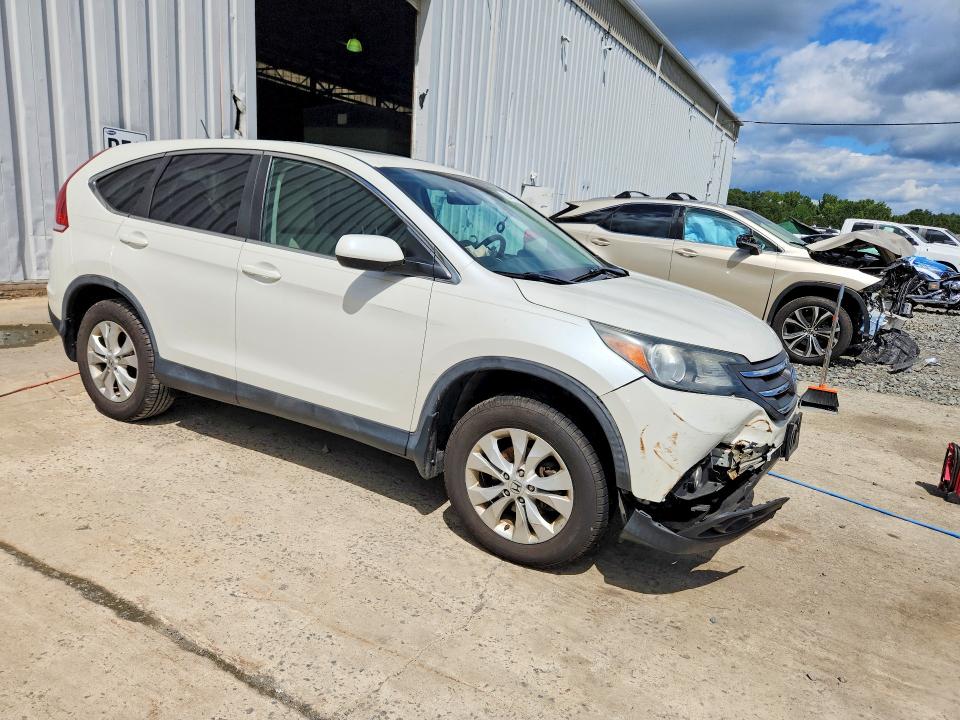 Photo 4 from auction – 2014 HONDA CR-V with VIN 5J6RM4H56EL009577