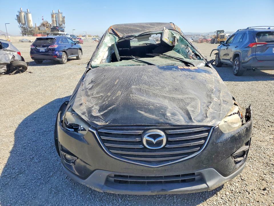 Photo 5 from auction – 2016 MAZDA CX-5 with VIN JM3KE2CY8G0616005