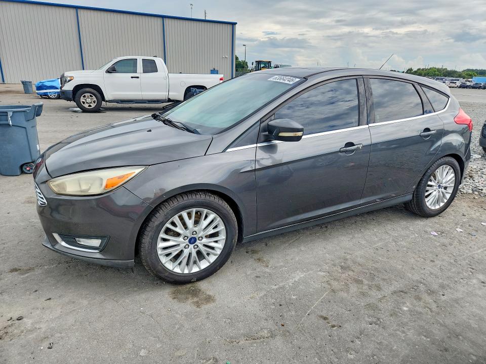 FORD FOCUS 2015 with VIN 1FADP3N20FL215304 - Photo from auction