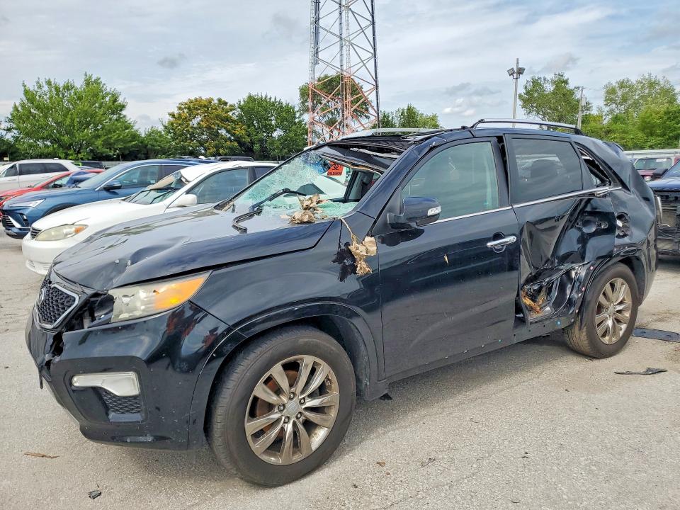 KIA SORENTO 2011 with VIN 5XYKW4A23BG150423 - Photo from auction